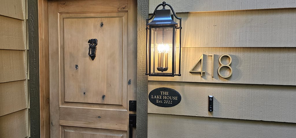 Door Knocker, House Number and Family Placker installed.
